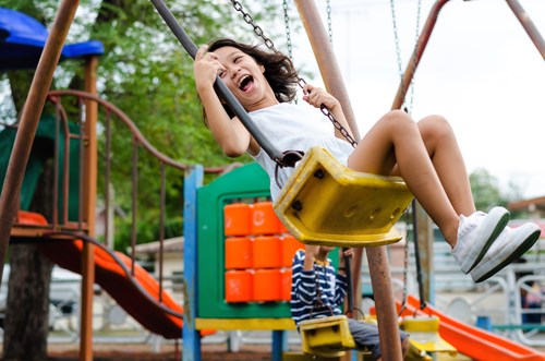 Young person on swing