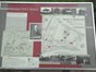 A board with local historical informatio on about the park