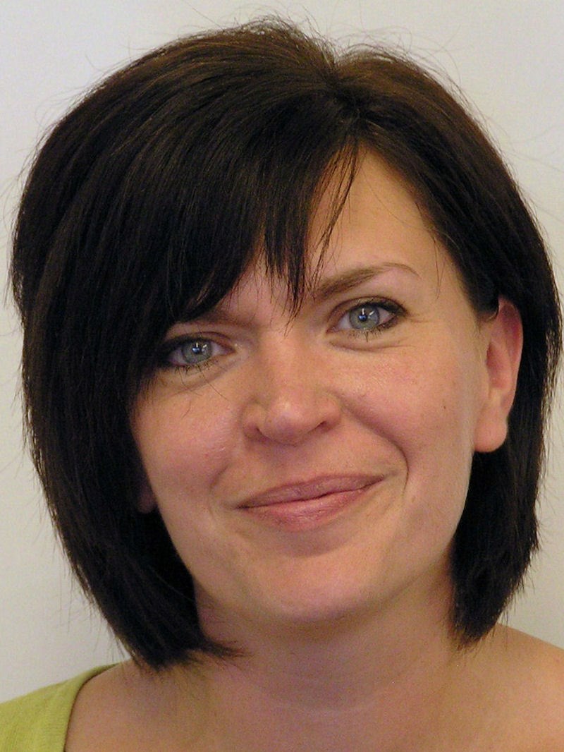 Headshot of female with short dark hair