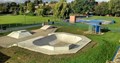 public use paddling pool, BMX track and skatepark in public green space area in local park