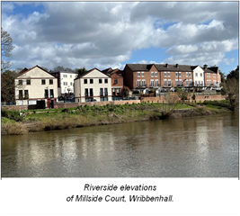 buildings along river bank