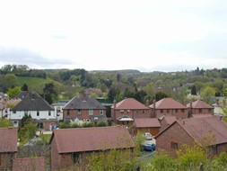 distant hills over rooftops