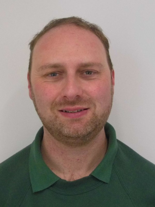 Headshot of bearded male