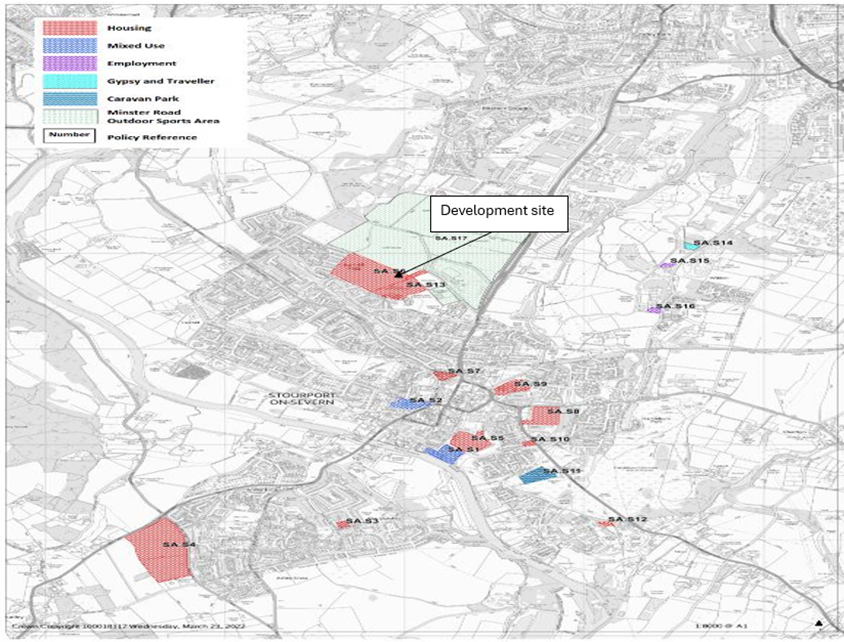 map showing various coloured areas including the development site marked with an arrow