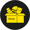 cardboard box with teddy bear, rubber ball, and children's toys in