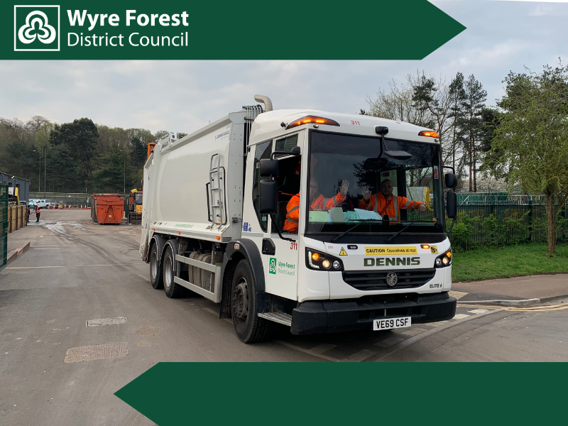 A large white HGV bin lorry 
