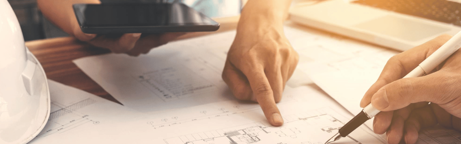 hand pointing at document on table