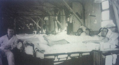 black and white photo of military hospital ward