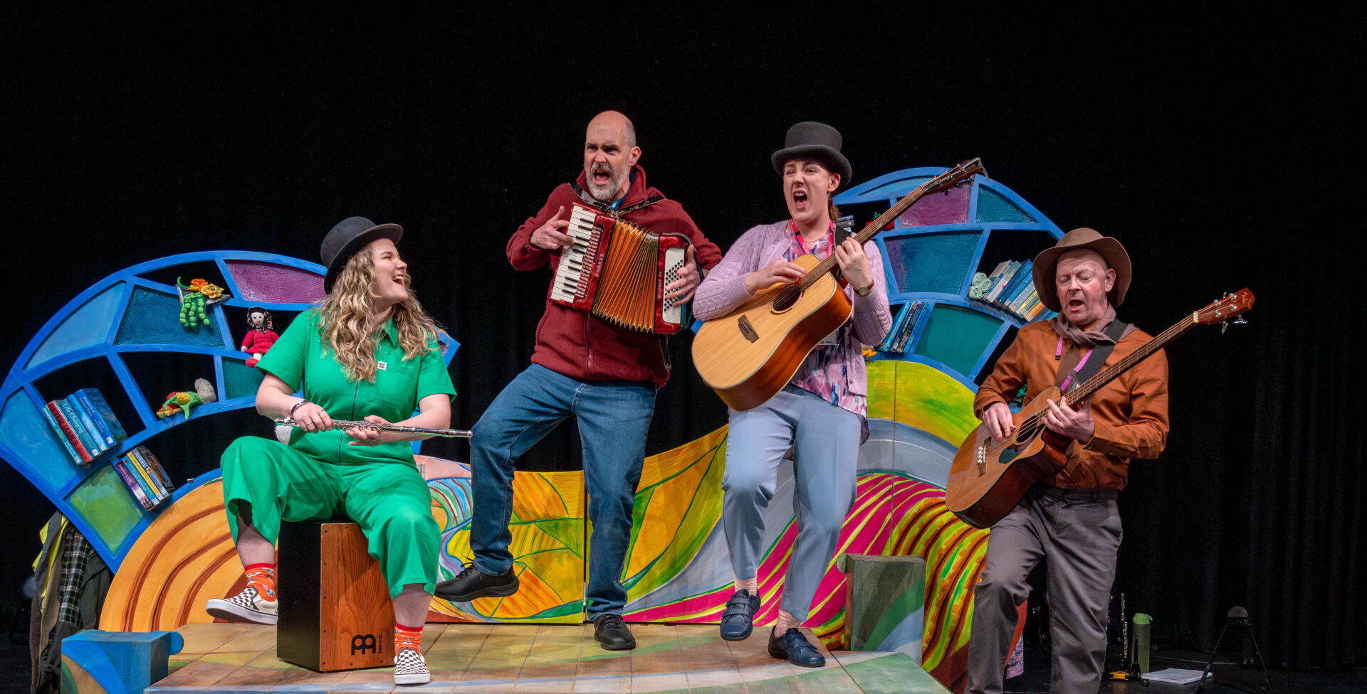 Photo of 4 performers of Mikron Theatre with their latest touring.