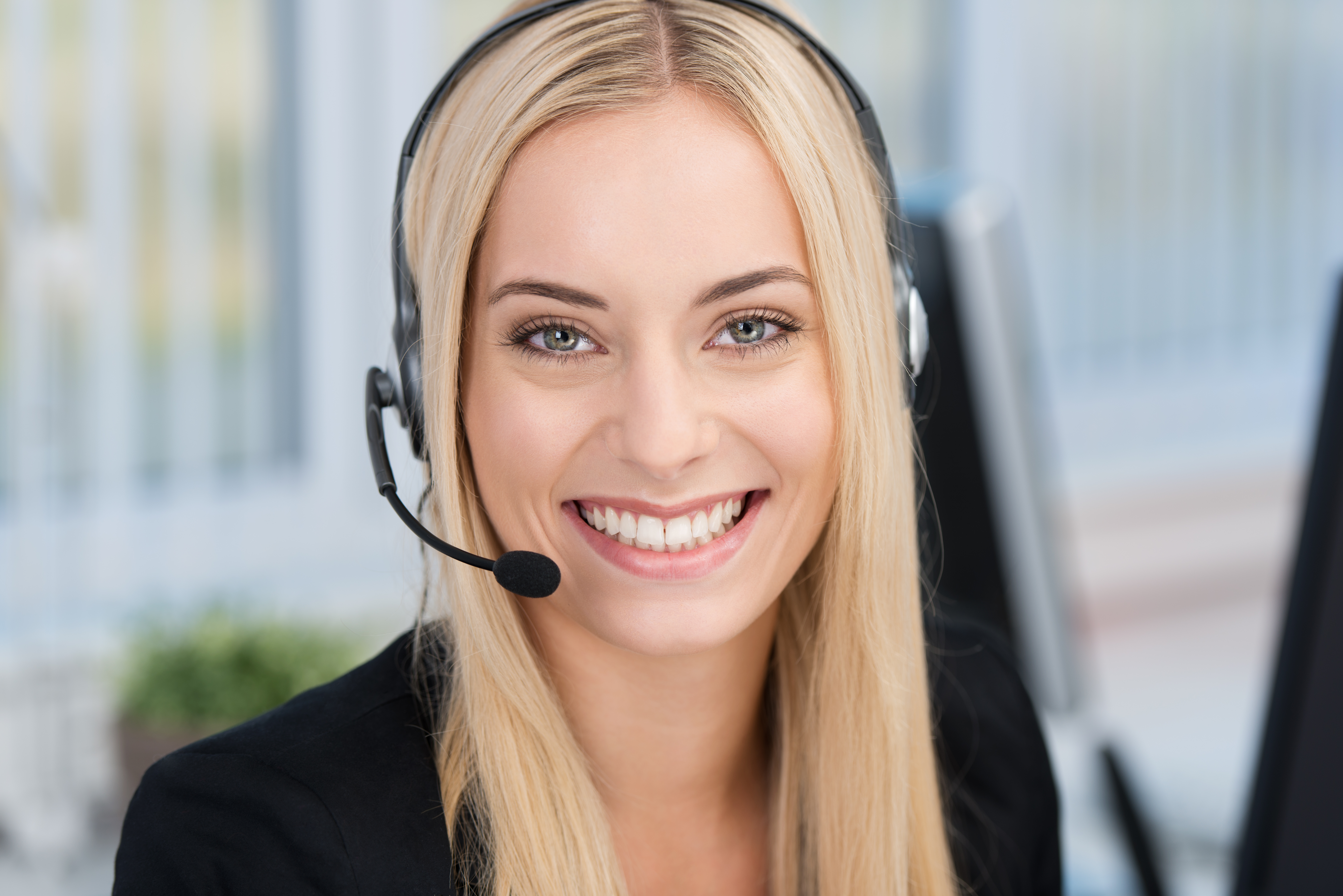 smiling woman in headset
