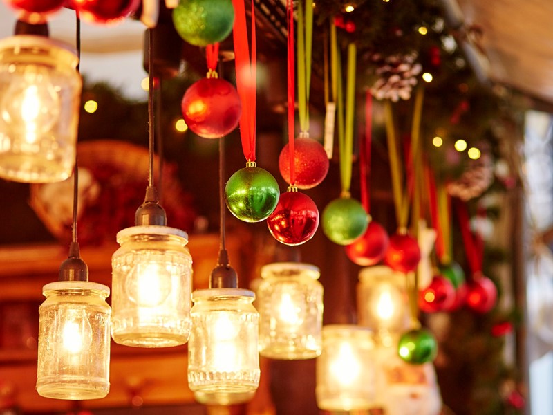 hanging jars with lights and hanging christmas red and green baubles