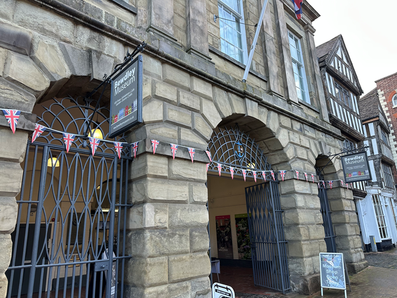 Exterior of Bewdley Museum, showing three archways with metal gates