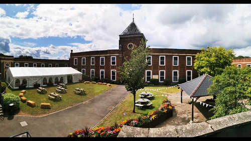 large brick building with clock tower