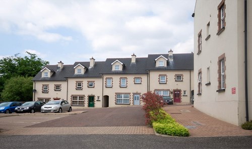 terraced housing with central carpark