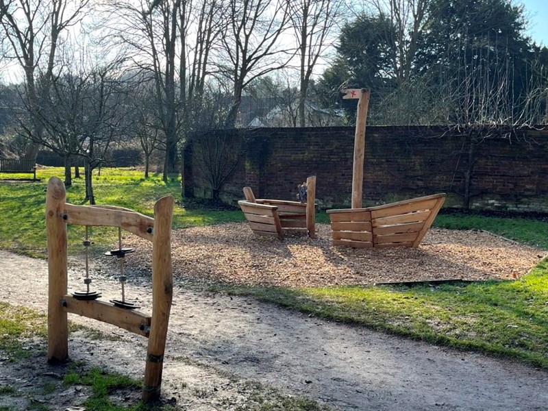 wooden play equipment in park
