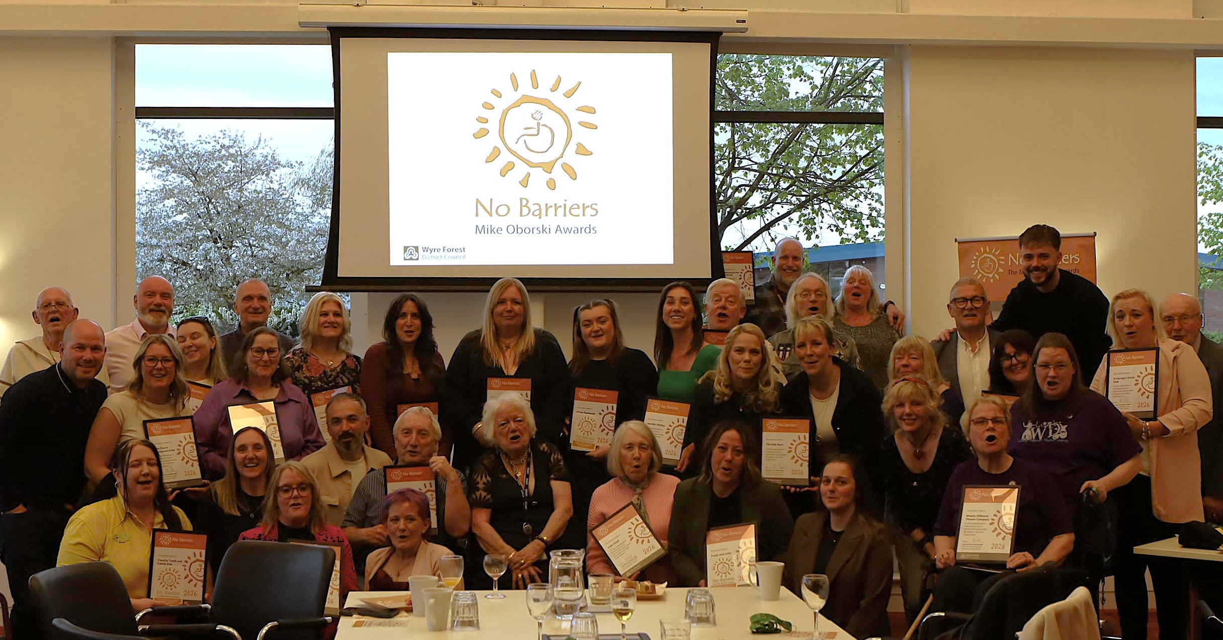 Photograph of a group of people at an awards ceremony