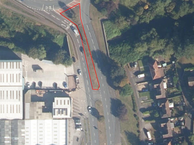 aerial view map of junction with large traffic island on Worcester Road showing pollinator patch in central reservation outlined in red