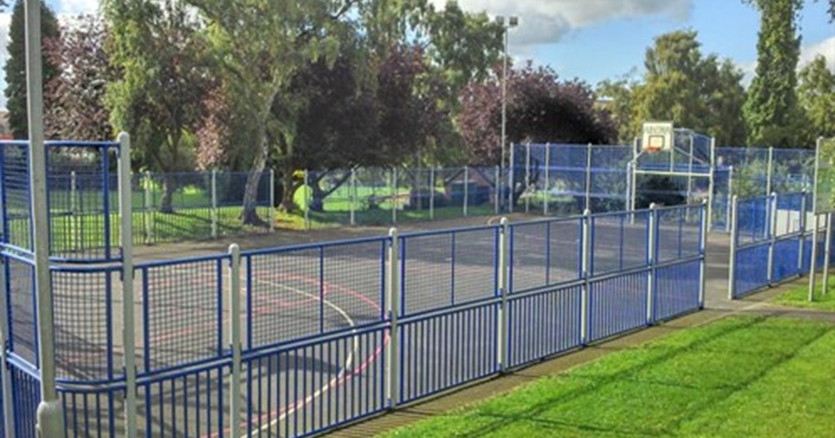 park with hardstanding area, marked out for various sports such as basketball paly area, cricket, and football.