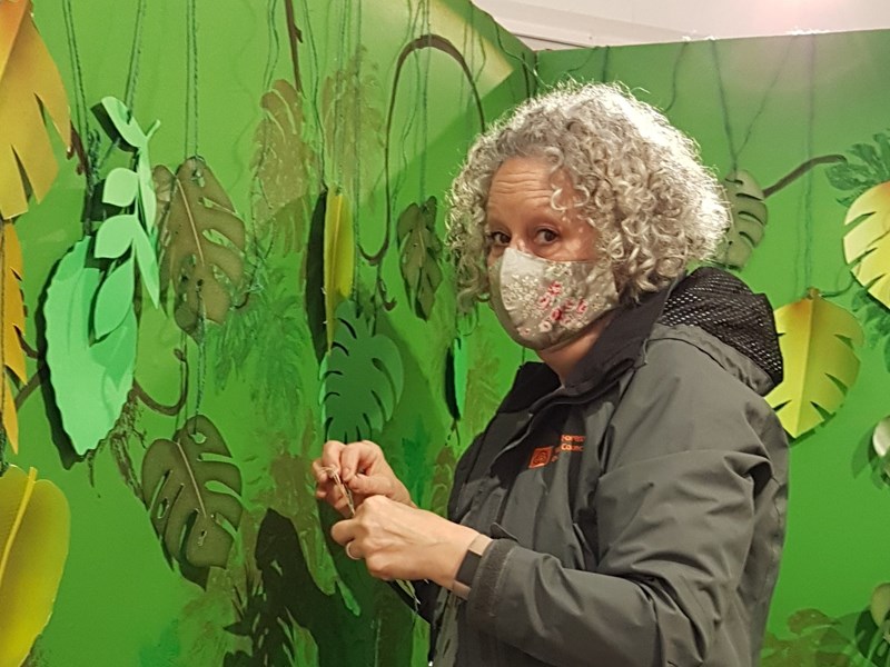 Photo of museum staff preparing exhibition space