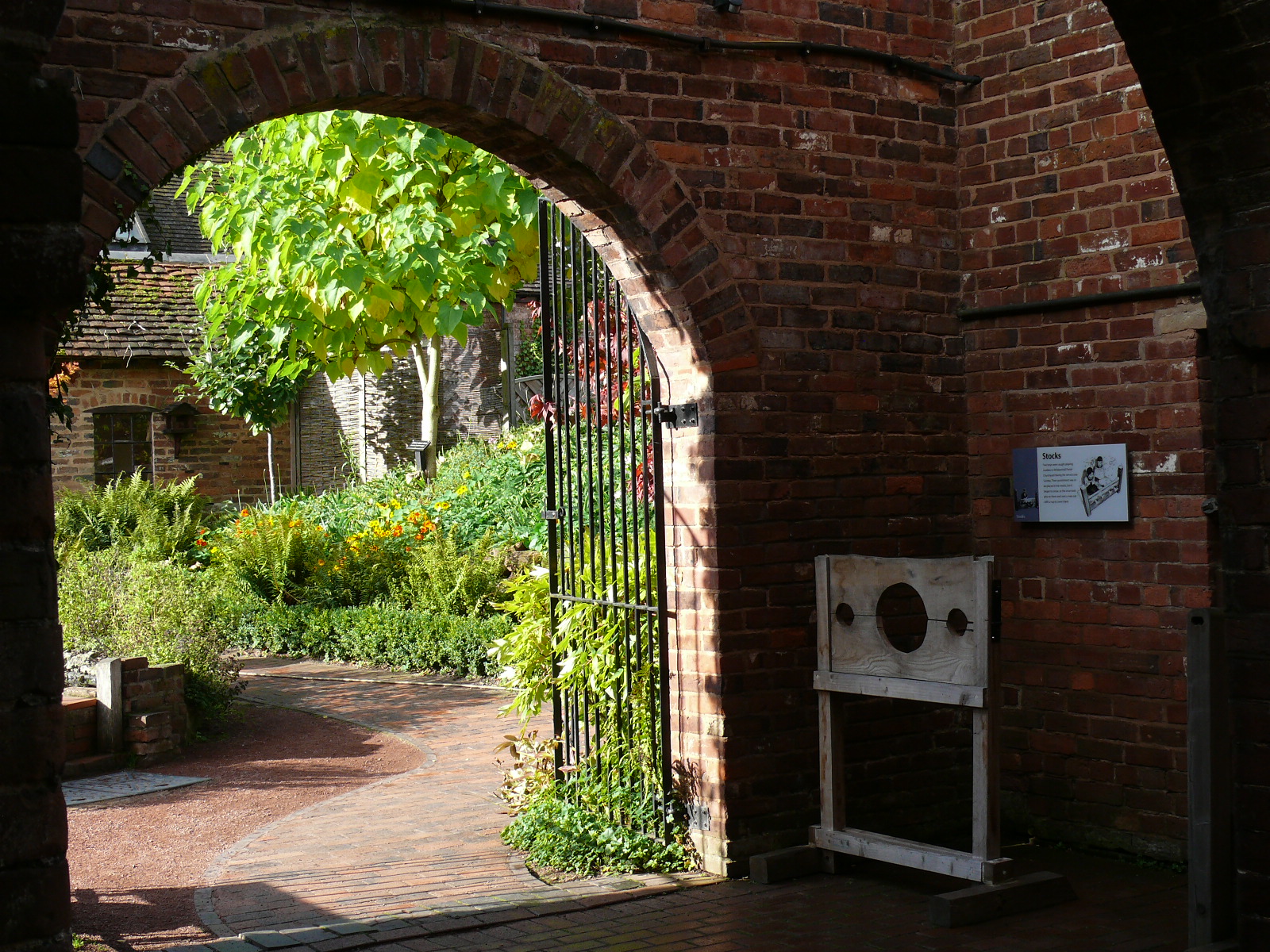 view through brick archway