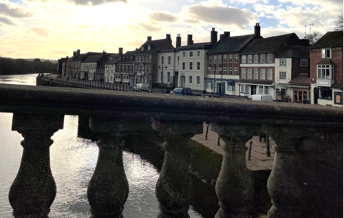 row of buildings seen from a bridge