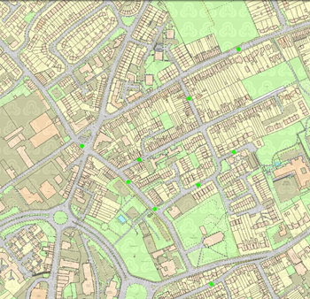Street map extract showing lots of streets some with green dots on